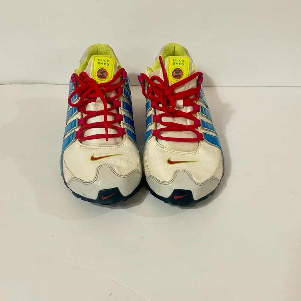 Nike Kids Shox Sneakers in White with Blue, Pink & Neon Yellow Accents